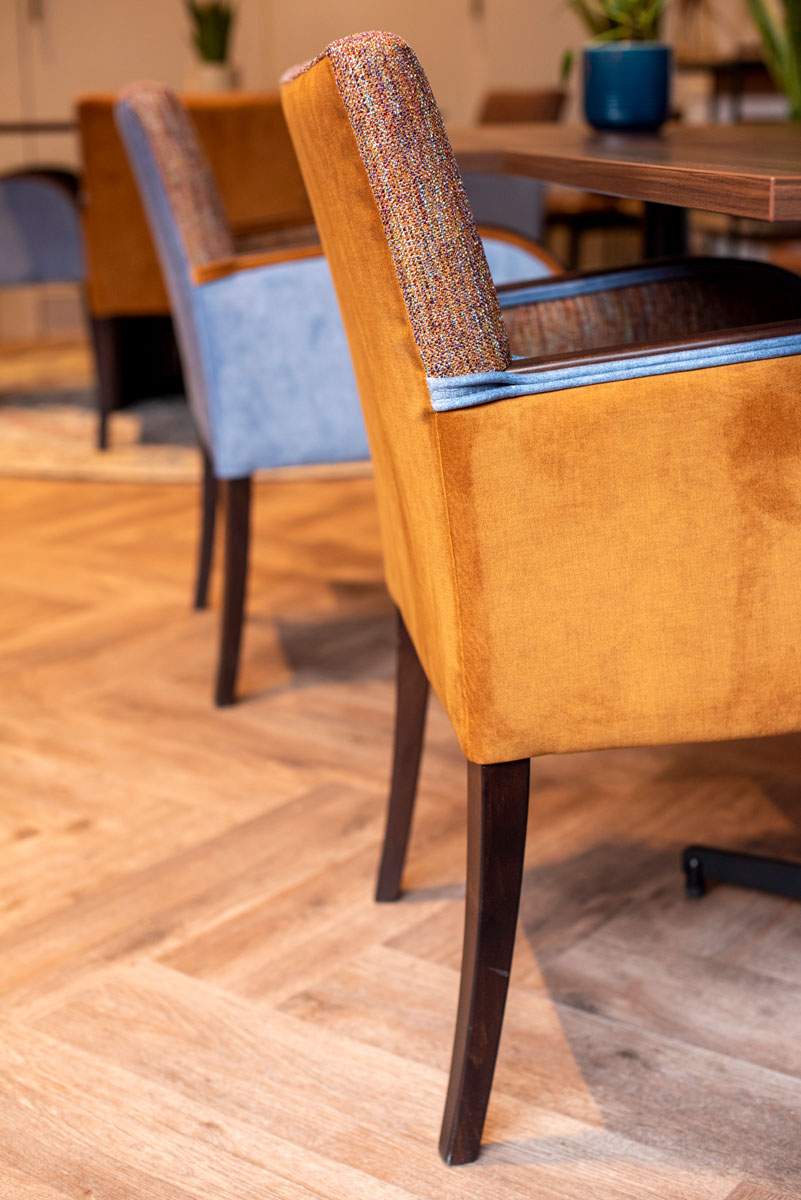 A design detail from the bespoke upholstery of a dining chair