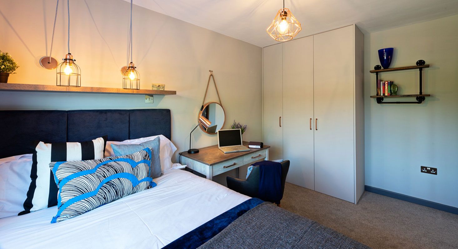 blue-interior-design-bedroom-scheme-with-built-in-wardrobes