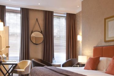 a luxury modern hotel bedroom designed by Flippa Interiors