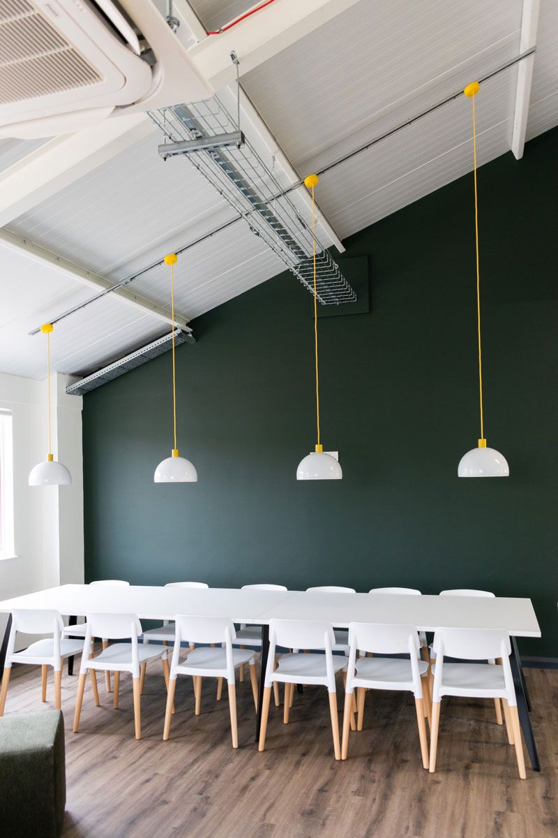 pendant-lights-hung-on-industrial-warehouse-roof